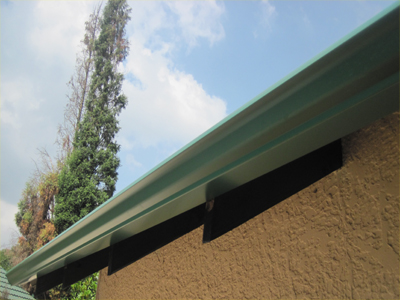 Gutter system - in Colonial Green.